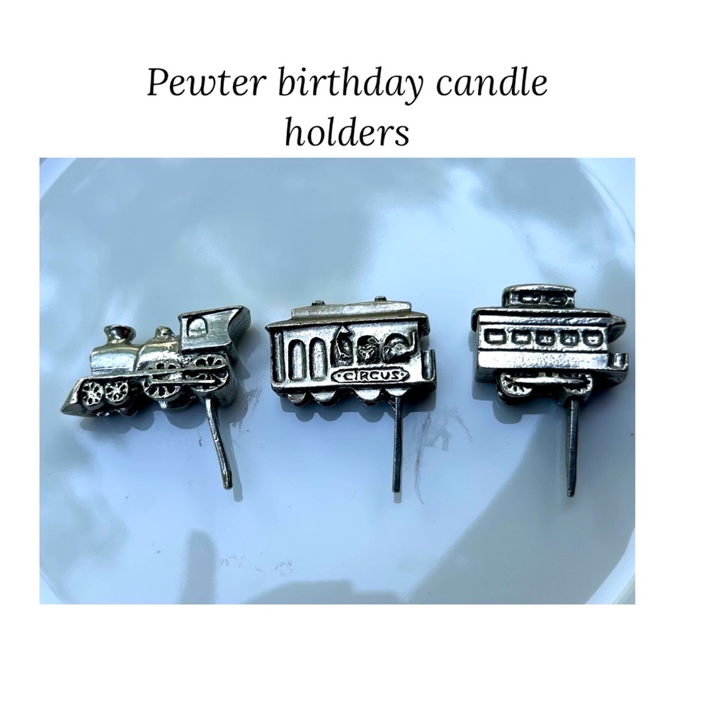 Pewter circus-train birthday candle holders.